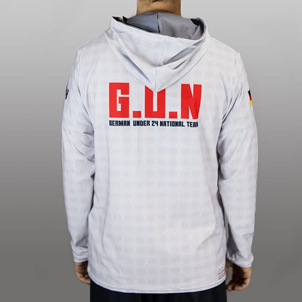 back of man wearing a grey hoodie