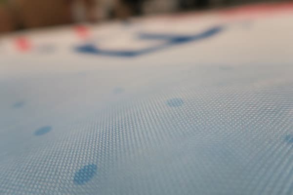 blurry close-up on banner showing texture