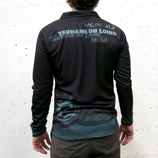 back of man wearing a black long sleved polo shirt