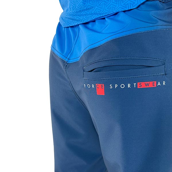 close-up view of the back pocket of a blue sublimated sports trousers