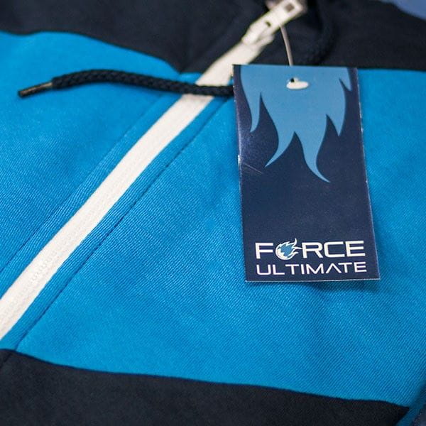 tag on dark and light blue stripped textile whith white zipper