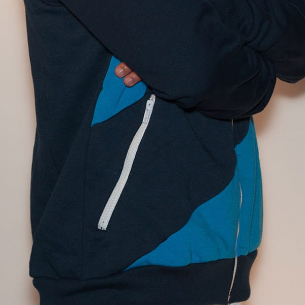 dark and light blue textile whith white zipper