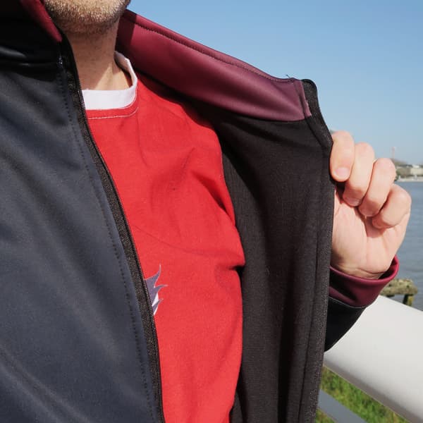 torso of man opening his black sport jacket