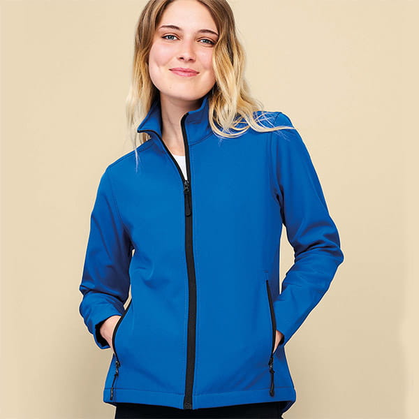 blond woman wearing a blue softshell